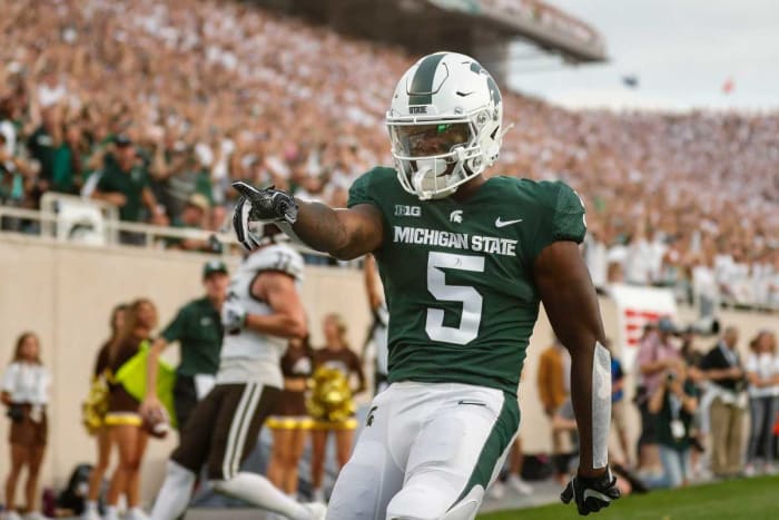Michigan State wide receiver Germie Bernard scores a touchdown against Western Michigan.